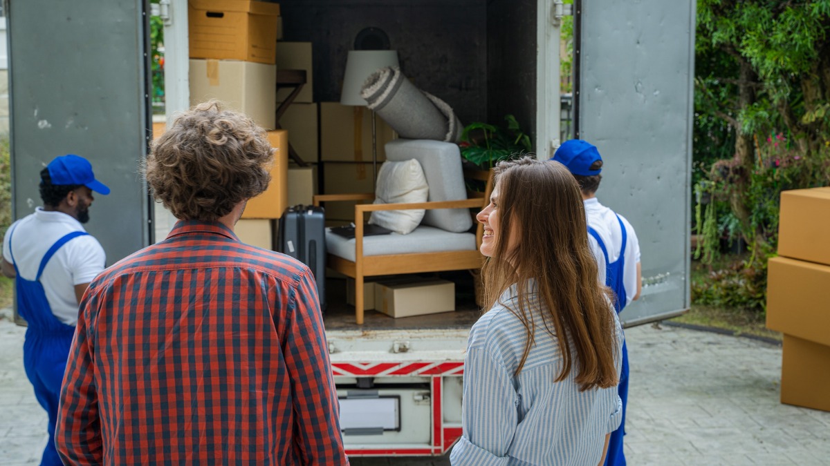 a moving truck filled with boxes and furniture